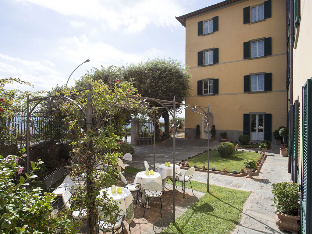 Villa Marsili Cortona — garden terrace with panoramic views over the Val di Chiana
