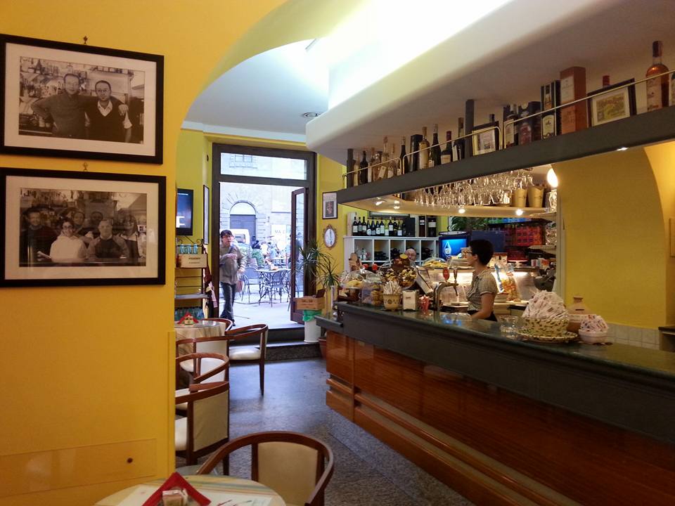 Best bars in Cortona — Caffè Vittoria interior looking out to Piazza Signorelli