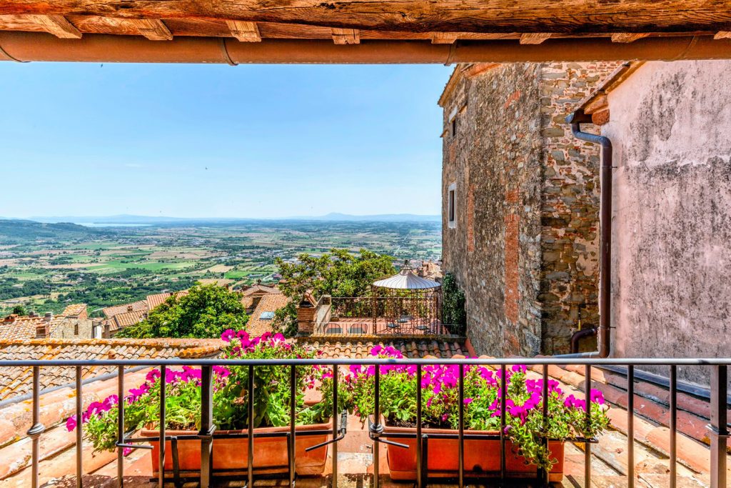 View from Hotel San Michele Cortona — balcony overlooking the Val di Chiana and Lake Trasimeno