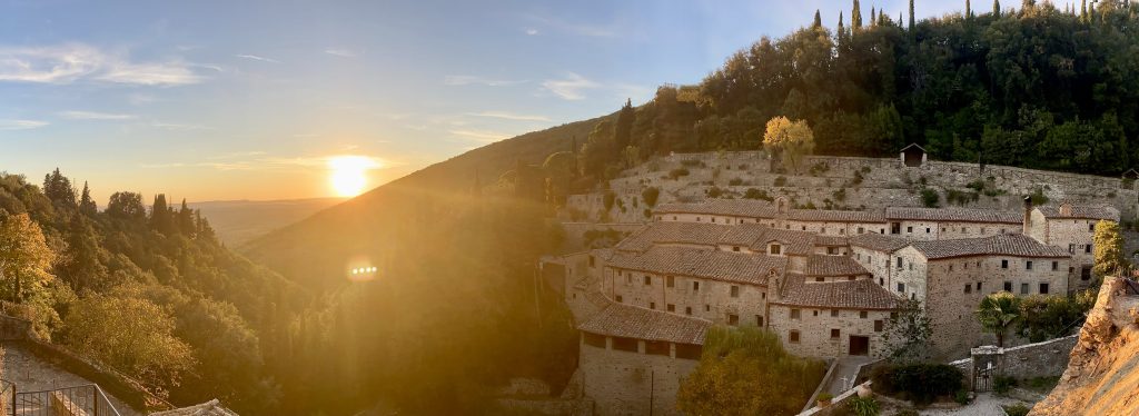Eremo Le Celle at sunset — the Franciscan hermitage near Cortona, Tuscany